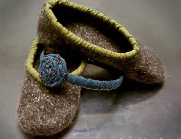 A simple pattern to knit felted wool slippers. Knits up in two hours, which which makes it a great DIY Christmas gift idea. Click for more details. | MakeAndDoCrew.com