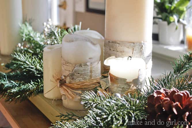 DIY Christmas decor idea--simple birch wrapped candles tutorial. | MakeAndDoCrew.com