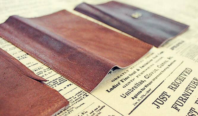 All you need for this inexpensive DIY gift for him is a thrifted leather wallet and a wood tray. This leather catchall tray makes a perfect DIY Father's Day gift idea, a quick Christmas craft for the man in your life or a third anniversary leather gift. | MakeAndDoCrew.com 