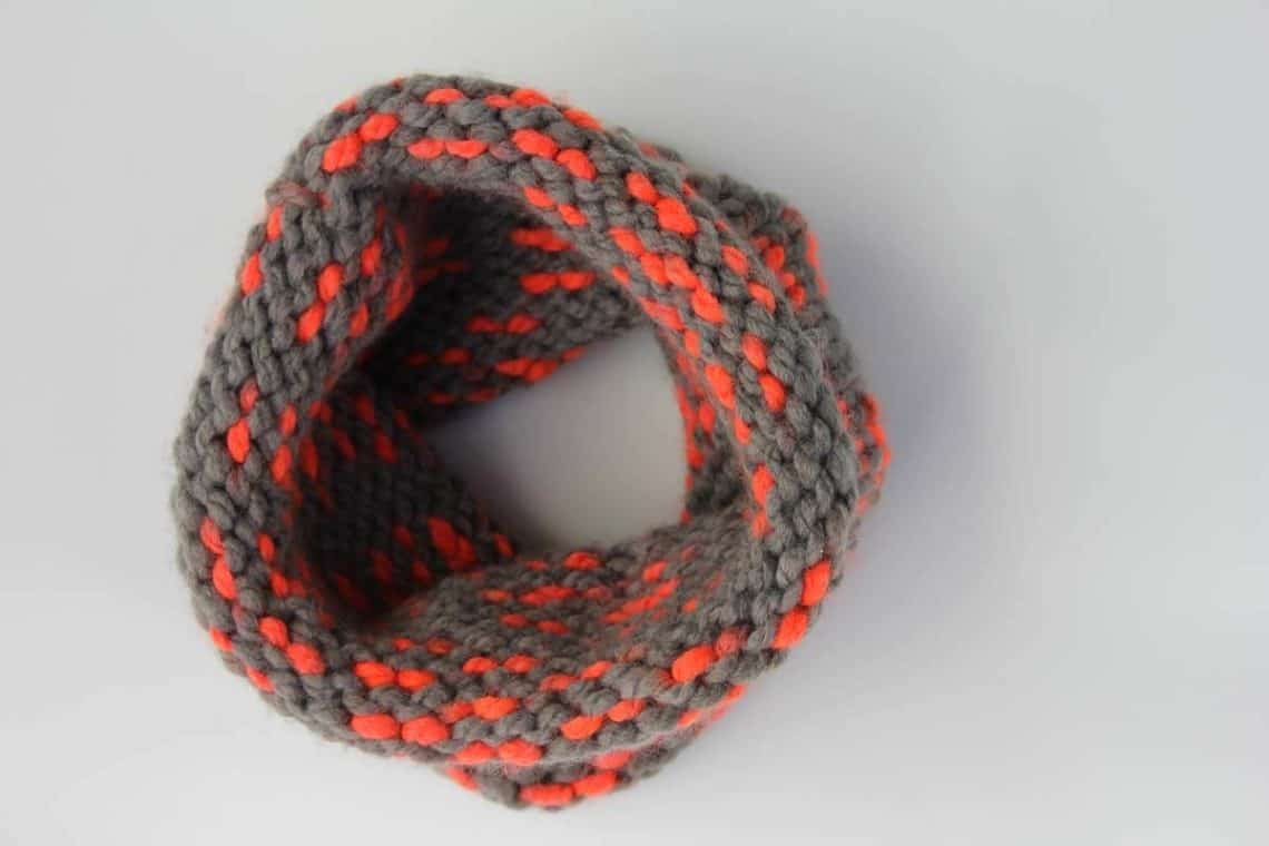 Super easy cowl scarf to make for a DIY gift this year. This free pattern uses Lion Brand Wool-Ease Thick and Quick in the color "Monarch." Sizes include toddler, child and adult. Click to view the free pattern! | MakeAndDoCrew.com