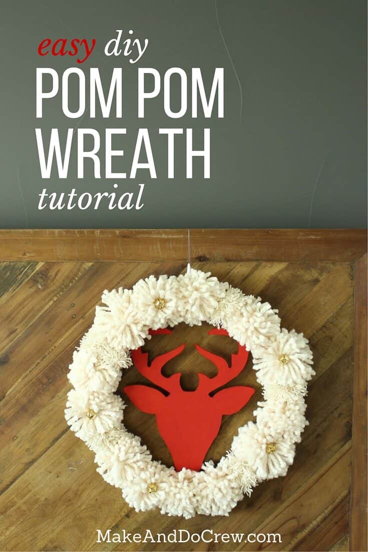 DIY Christmas wreaths are the best! The idea for this DIY Christmas wreath was inspired by a Pottery Barn wreath that costs $129! The DIY version takes less than an hour and is made using a wooden wreath form, DIY pom poms and some jingle bells. Click to view the full step-by-step tutorial. | MakeAndDoCrew.com