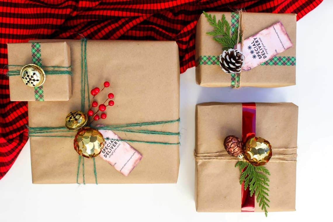 Christmas DIY gift wrap ideas with supplies from the dollar store. These gift topper ideas are sophisticated, festive and cheap! Click to see full tutorial. | MakeAndDoCrew.com