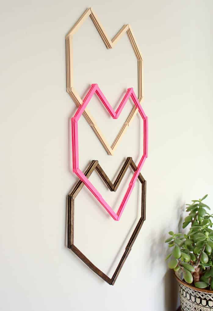 This graphic, modern DIY wall art idea is perfect for a hip nursery, bedroom or as wedding or Valentine's Day decor. Make it for $5-10! Click for the free template and full tutorial. | MakeAndDoCrew.com