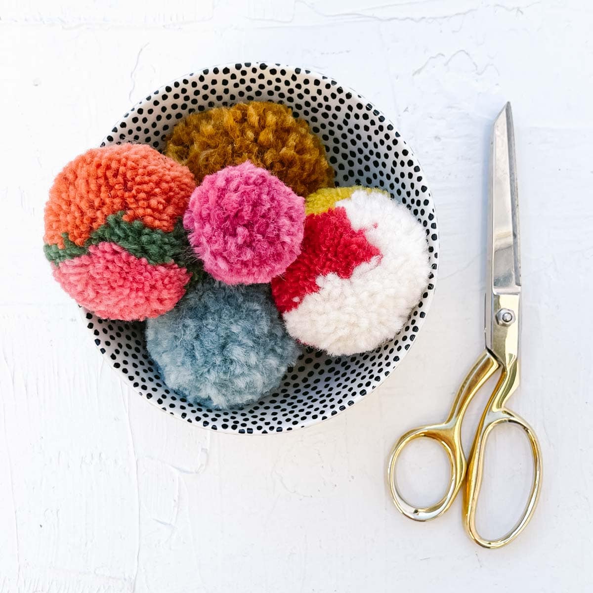 How to Make Pom Poms: Tutorial for Knit & Crochet Hats, + More