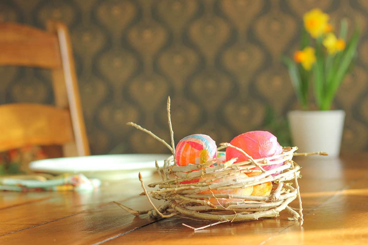 Add some organic texture and charm to your Spring decor with a DIY bird’s nest made from found twigs and branches. This craft idea is quick to make and virtually free! Click for step-by-step tutorial. | MakeAndDoCrew.com