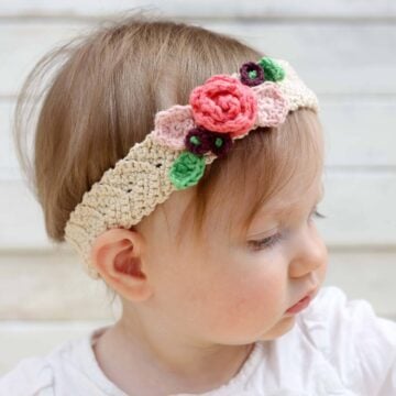This free crochet headband pattern with flowers is surprisingly easy and it makes an adorable headpiece for a young flower girl in a wedding (or a bohemian beauty of any age)! Sizes include newborn, baby, toddler, child, teen and adult. | MakeAndDoCrew.com