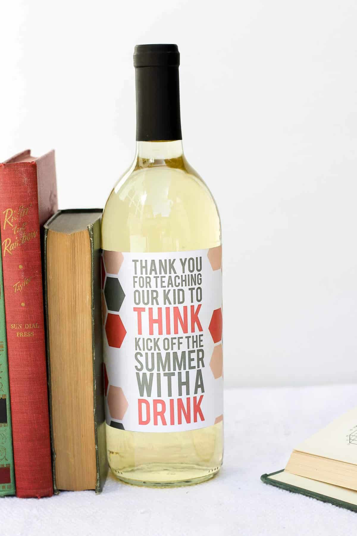 What better way to say "thank you" to a teacher at the end of the school year than with a little wine present? This free wine label printable makes an easy, yet memorable DIY teacher appreciation gift. Click to download the free printable. | MakeAndDoCrew.com