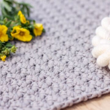 This beginner-friendly video tutorial shows you how to crochet the Suzette stitch, which is used my my free crochet tote bag pattern. This stitch is very simple, but creates an interesting, sophisticated texture.