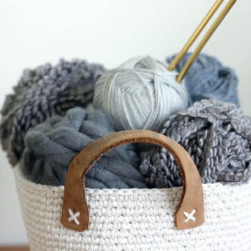 Inexpensive utilitarian twine (from Dollar Tree!) and a thrifted leather belt combine to create a primitive, yet sophisticated home decor piece. This free crochet basket pattern is exceptionally easy to make with only single crochet stitches and can be customized to any size. Click for the free pattern and photo tutorial.