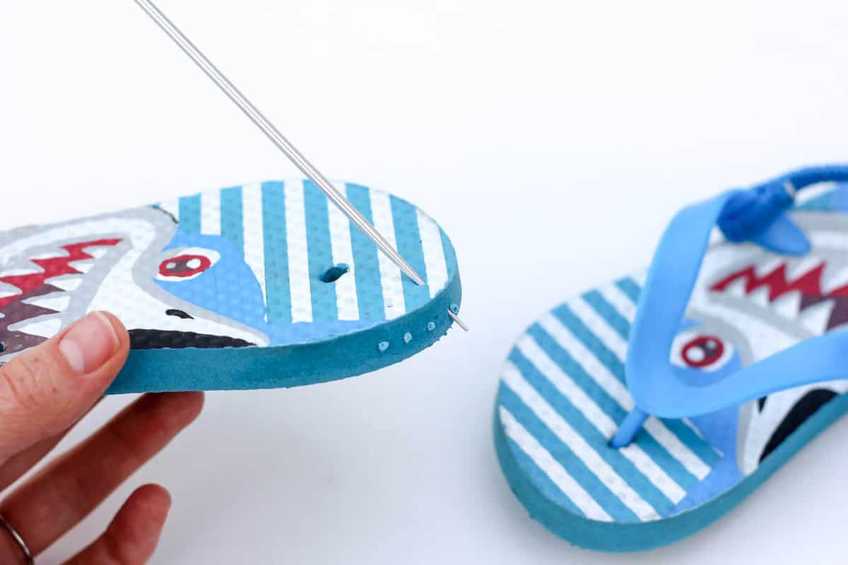 Turn cheap flip flops into crochet toddler slippers with this free pattern. The boat shoe style works well for girls and boys. Quick and fun project! | MakeAndDoCrew.com