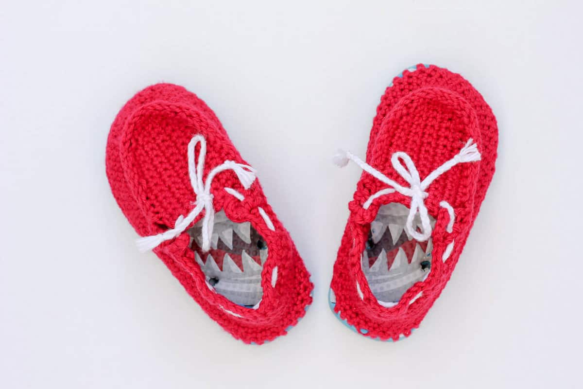 Make cheap flip flops (thongs) into crochet toddler slippers with this free pattern. The boat shoe style works well for girls and boys. Quick and easy project!