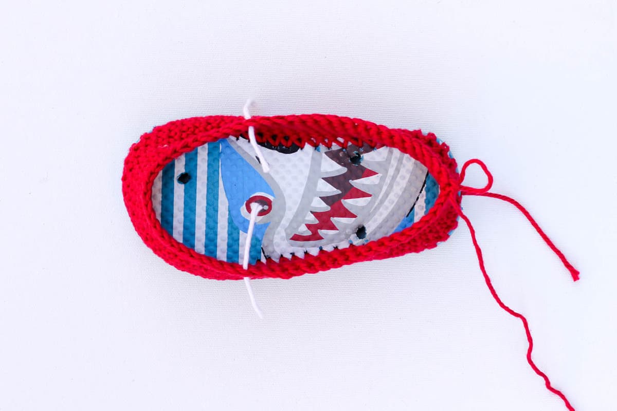 Turn cheap flip flops into crochet toddler slippers with this free pattern. The boat shoe style works well for girls and boys. Quick and fun project!