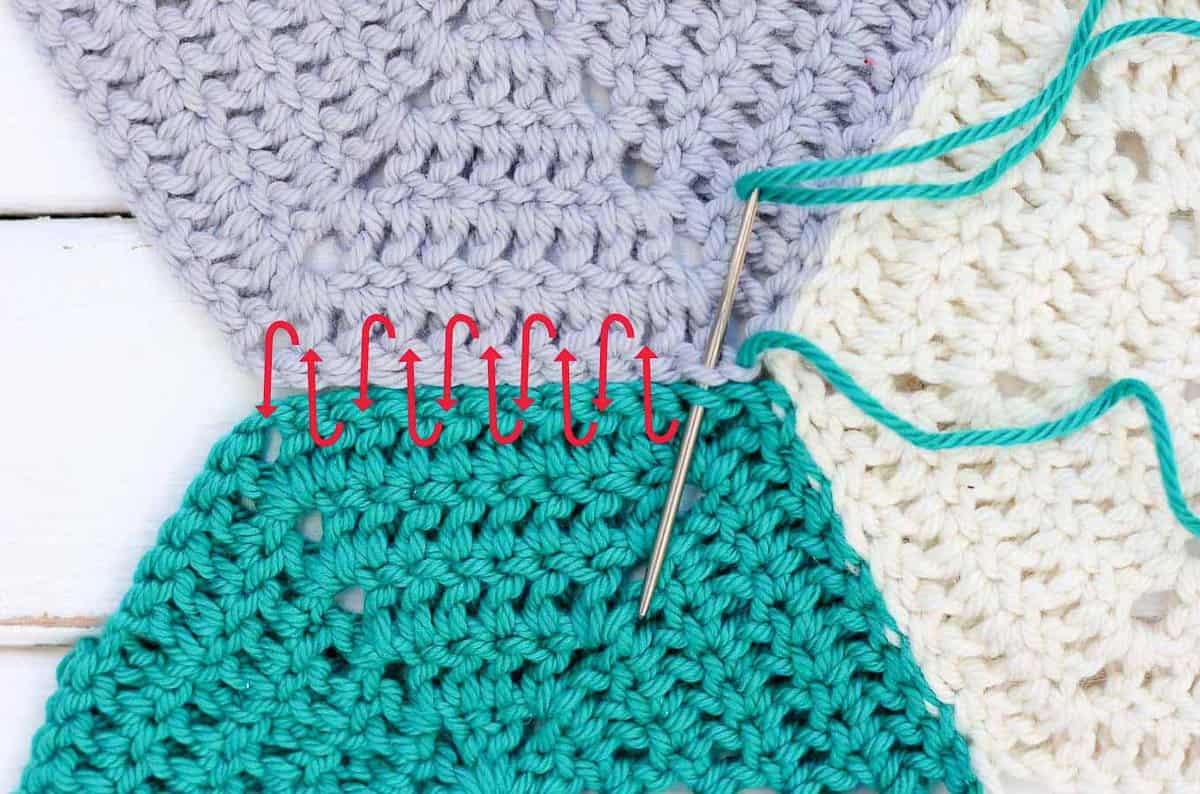 This photo tutorial will show you how to join crochet hexagons with a technique that results in an invisible seam. Great for sewing hexagons together, but can also work for granny squares or other crochet pieces. | MakeAndDoCrew.com