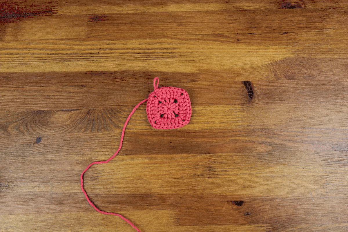 This free crochet pillow pattern with a modern heart makes a perfect DIY gift idea. Square cushion pattern includes written instructions, photo tutorial and a chart. | MakeAndDoCrew.com