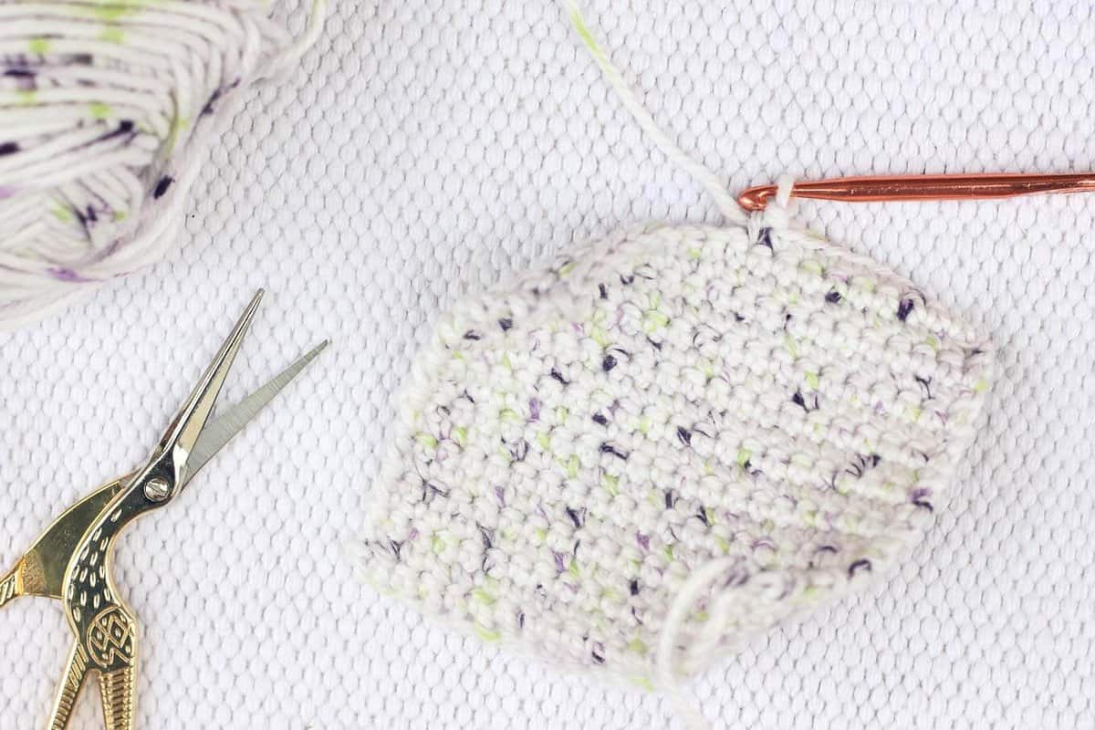 This free crochet pattern is perfect for beginners and a great way to use up dried lavender from your garden! Pop one of these crochet lavender sachets in the dryer and you've got natural and inexpensive way to keep your laundry smelling fresh! Yarn picured is "I Love This Cotton" from Hobby Lobby.| MakeAndDoCrew.com