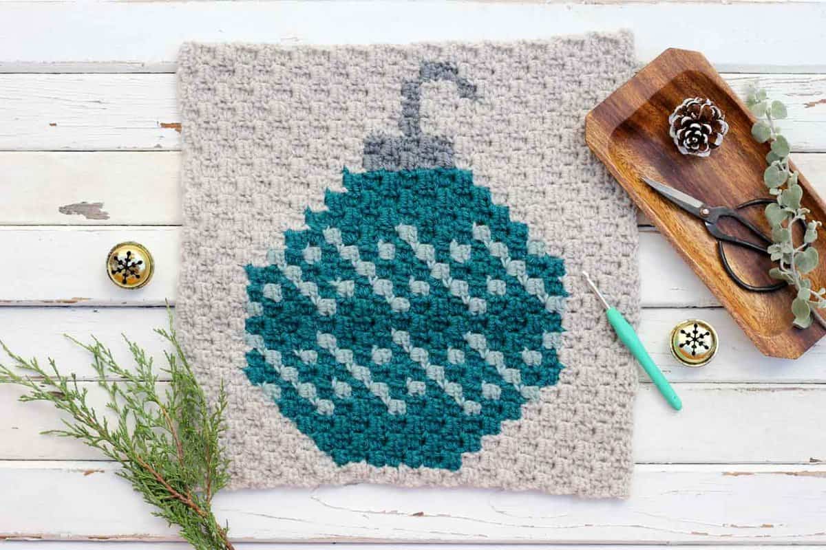 This C2C crochet Christmas pattern is the second in my free afghan series. This monochromatic bulb ornament would work great as a festive pillow front too! Click to download the other free graphs for this festive, modern afghan! 