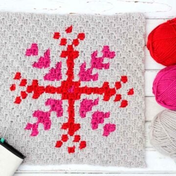 This free c2c crochet graph makes a graphic, modern, monochromatic snowflake. Crochet several for a bright, happy winter afghan or check out the rest of the Christmas corner-to-corner patterns to make a sampler afghan.