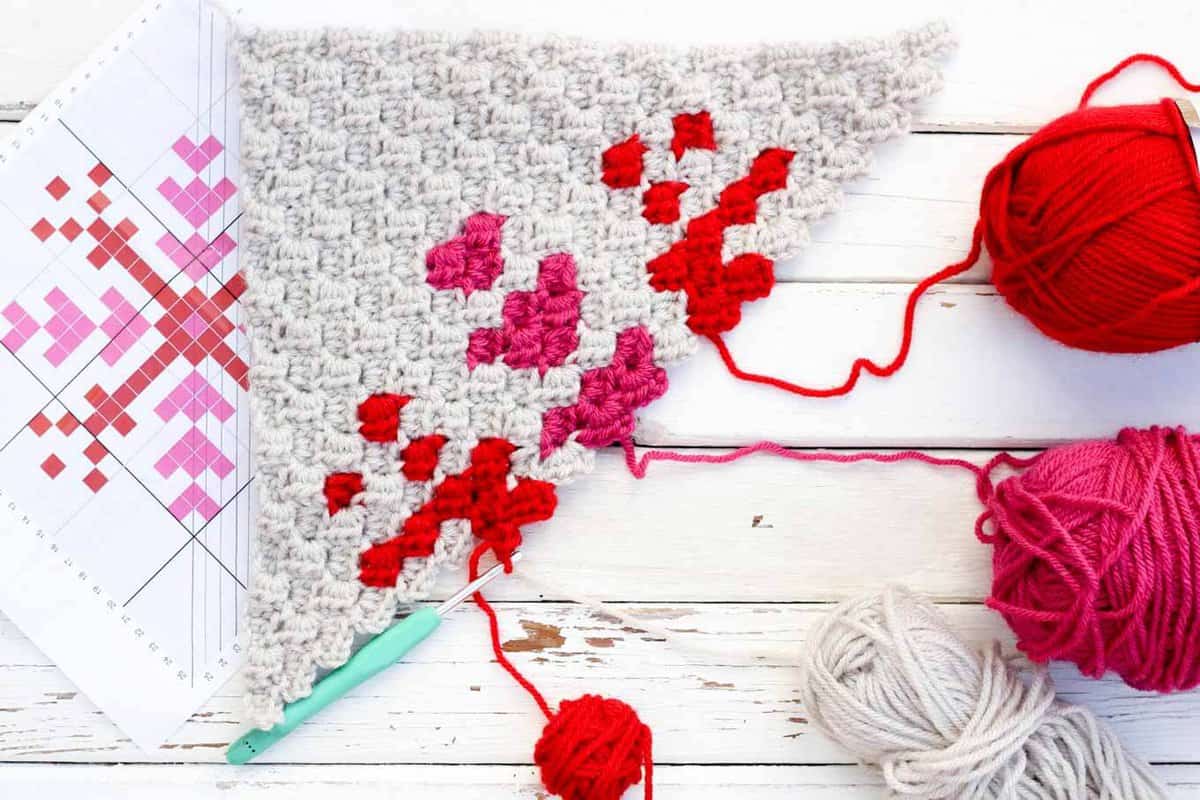 This free c2c crochet graph makes a graphic, modern, monochromatic snowflake. Crochet several for a bright, happy winter afghan or check out the rest of the Christmas corner-to-corner patterns to make a sampler afghan.