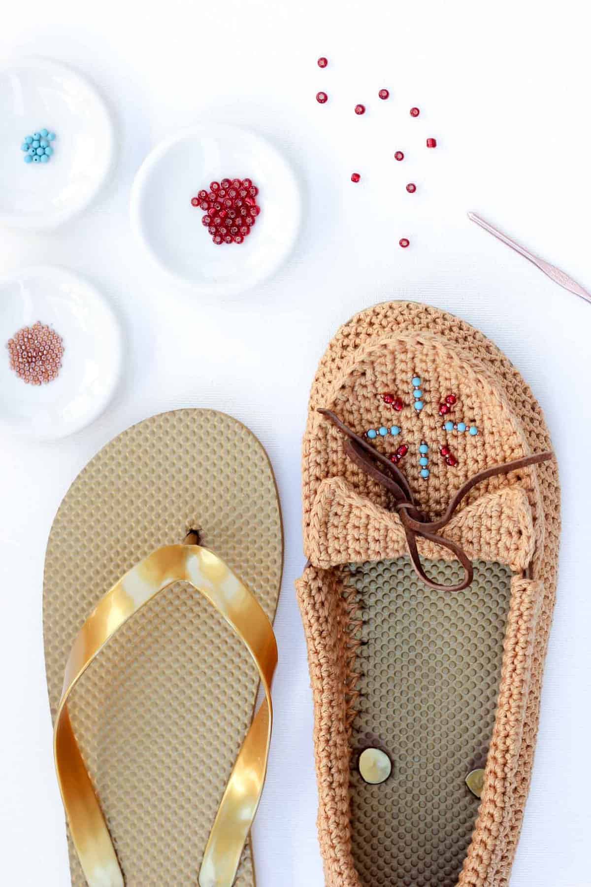 Learn how to crochet shoes with flip flop soles with this free crochet moccasin pattern and video tutorial! These crochet moccasins make super comfortable women's shoes or slippers and can be customized however you wish. Made from Lion Brand 24/7 Cotton in "Camel" color. Seed beads add the perfect bohemian touch!