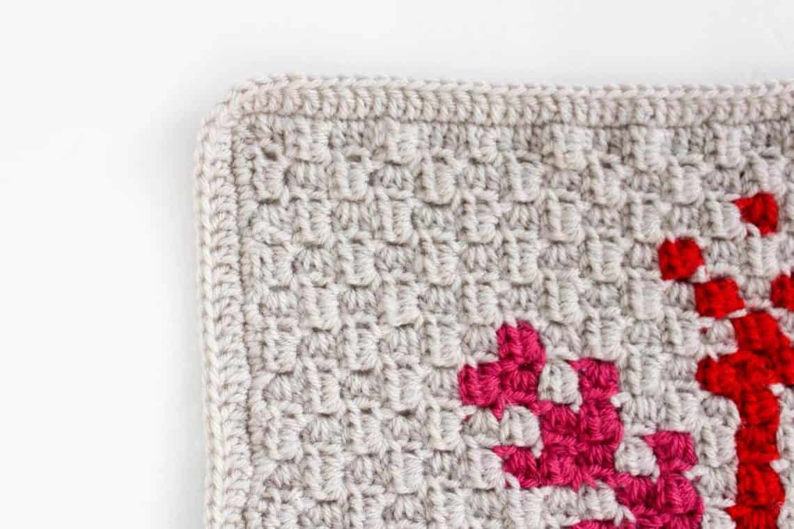 You've worked diligently on creating corner-to-corner crochet squares and now you're wondering what to do with them, right? This tutorial will show you how to add a border to a C2C afghan block so that it's ready to be sewn together into a blanket.