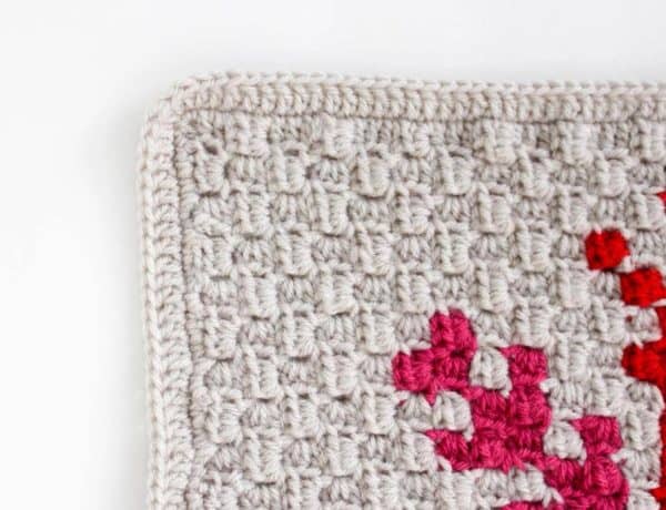You've worked diligently on creating corner-to-corner crochet squares and now you're wondering what to do with them, right? This tutorial will show you how to add a border to a C2C afghan block so that it's ready to be sewn together into a blanket.