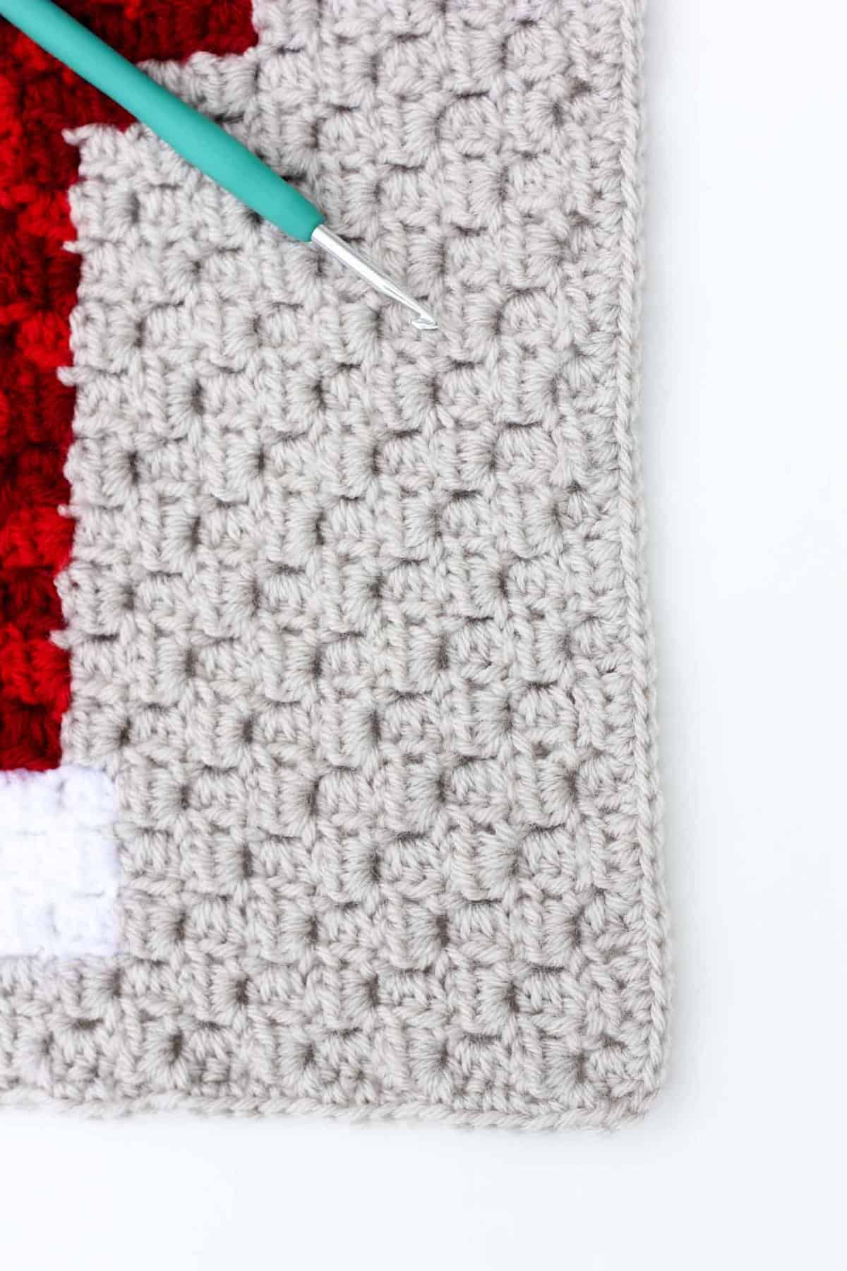 You've worked diligently on creating corner-to-corner crochet squares and now you're wondering what to do with them, right? This tutorial will show you how to add a border to a C2C afghan block so that it's ready to be sewn together into a graphgan.