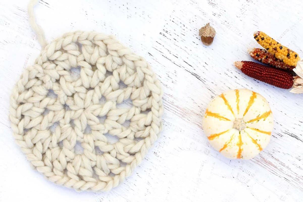 Add a chunky wool-wrapped pumpkin to your Thanksgiving tablescape with this easy fall crochet pattern! This pumpkin cozy centerpiece works up quickly in bulky yarn-L.B. Collection Natural Wool by Lion Brand. 