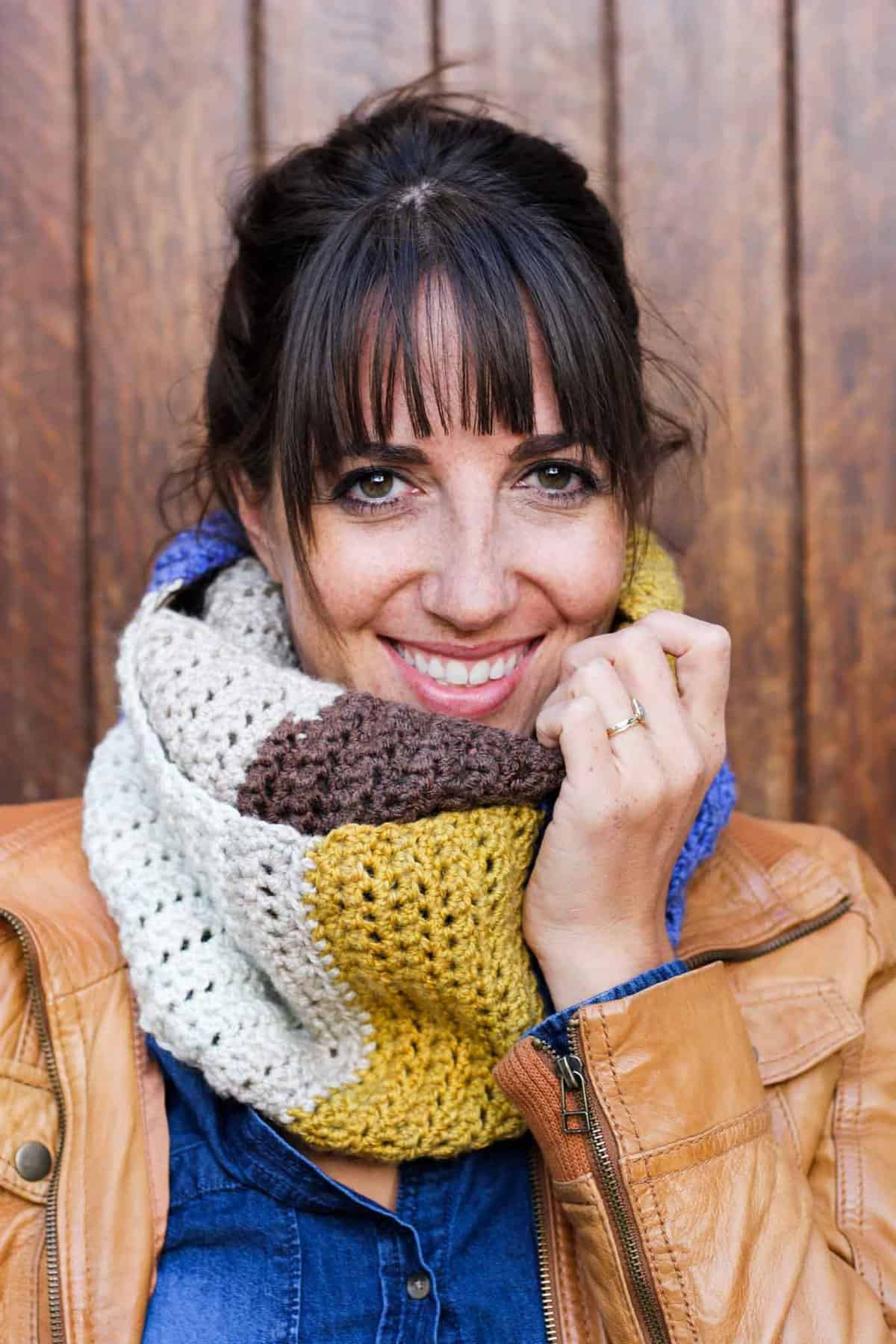 This easy, modern cowl is going to become your go-to accessory for fall and winter! Plus, this Caron Cakes Yarn free crochet pattern is simple to make even if you're not an experienced pattern-reader. Simple one-skein crochet project! Caron Cakes color "Blue Icing."