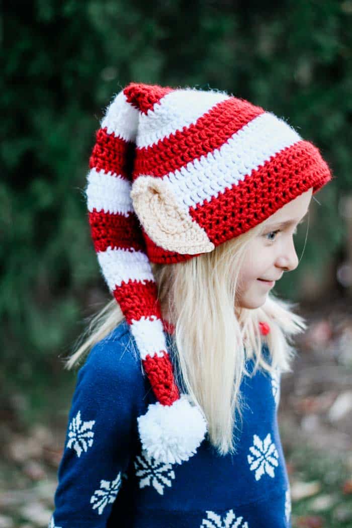 This free crochet elf hat pattern with ears is worked in the round and makes a fast crochet Christmas gift idea for babies, kids and adults!