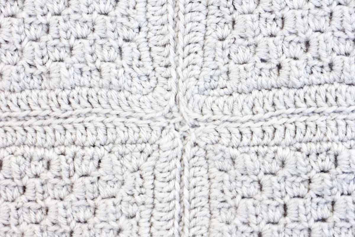 Crocheted blocks sewn together with the mattress stitch. This video tutorial will teach you how!