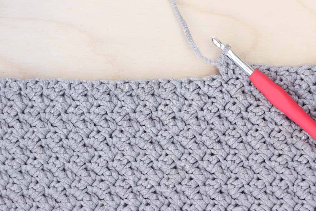 Video tutorial: how to crochet the Suzette stitch from Make and Do Crew. Great beginner stitch for afghans and baby blankets. Pictured in Bernat Maker Home Dec yarn "Clay."