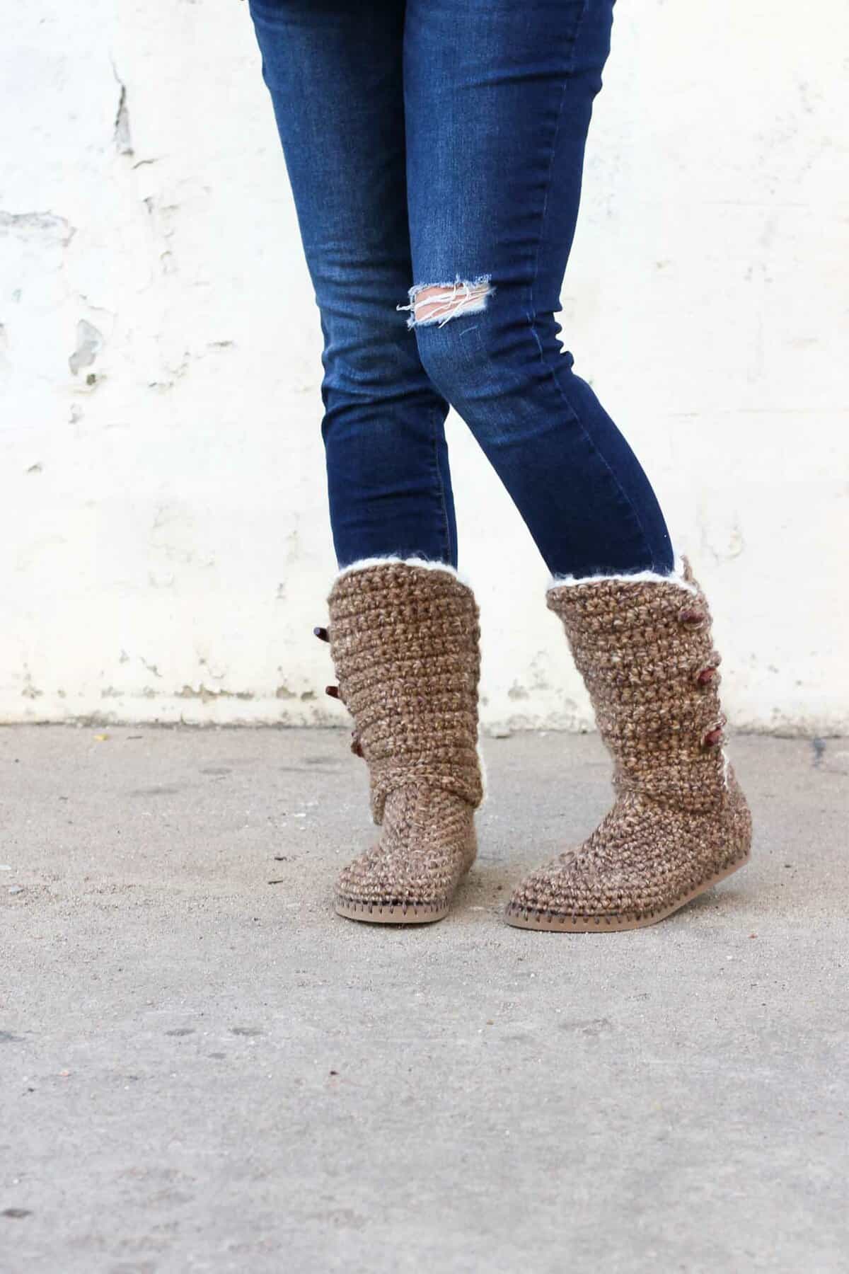Learn how to make "Breckenridge" Boots with flip flop soles in Part 1 of this free crochet pattern and video tutorial. This adult-sized pattern makes super cozy slippers or even crochet shoes to wear outside. Made with Lion Brand Wool Ease Thick and Quick in "Toffee."