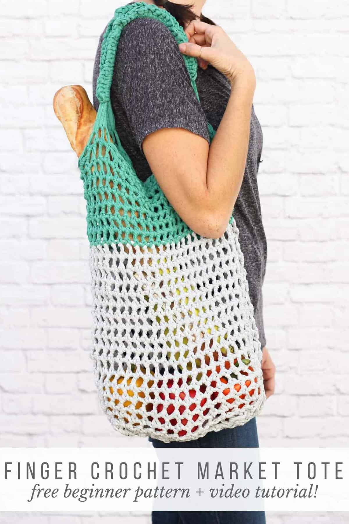 This free market tote bag pattern and video tutorial is the perfect introduction on how to finger crochet! A speedy, satisfying project for adults and kids alike. Made using Lion Brand's Fast-Track yarn in "Chopper Grey" and "Go Kart Green." | MakeAndDoCrew.com
