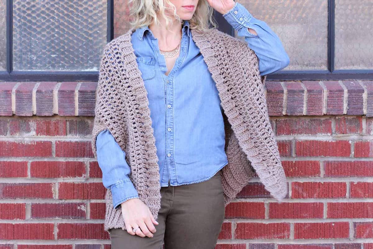 You'd never guess by looking at this sweater that it's made from two simple rectangles! The "Cocoon Cardigan" free crochet pattern is great for beginners who are looking to expand their skills or advanced crocheters who want a quick, stylish project. Made with Lion Brand Lion's Pride Woolspun yarn in "Taupe." 