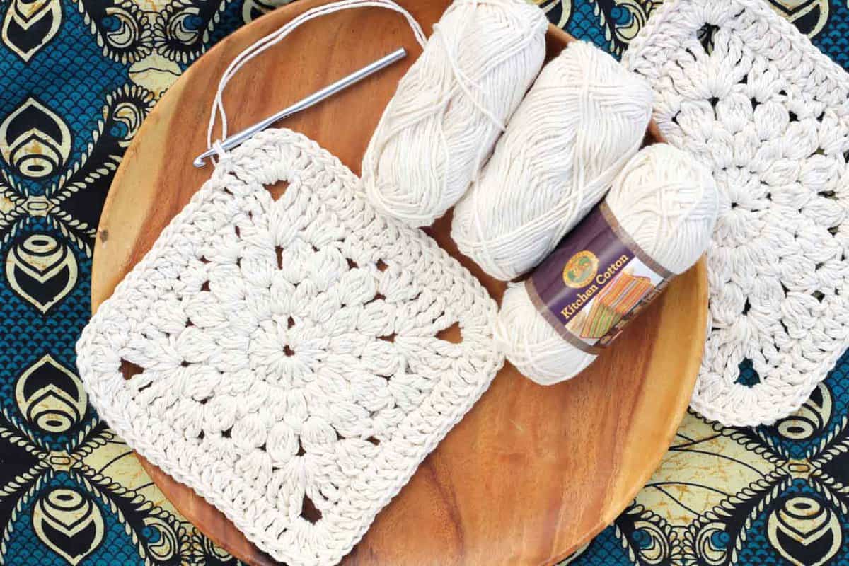 Boho love! This boho free crochet tote bag pattern is fun to put together and loaded with bohemian charm. Made with Lion Brand Kitchen Cotton in "Vanilla." 