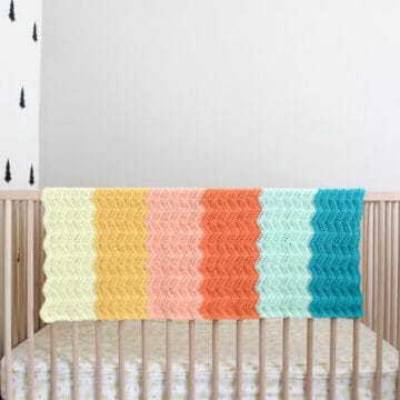 Gorgeous! Every new baby deserves a warm welcome into the world and this easy crochet baby blanket pattern puts a modern twist on the traditional ripple. Made using Lion Brand's Baby Soft yarn.