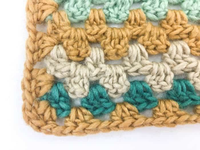 How to crochet a granny stitch border around a sweater or afghan. 