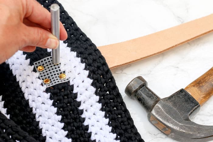 Learn how to add leather handles to a crochet or knit bag using stylish gold rivets and plastic canvas. 