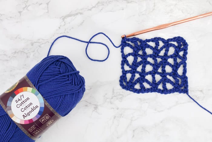 The crochet triangle stitch made using Lion Brand 24/7 Cotton.