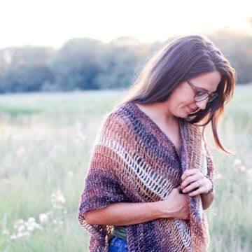 Wrap up in a shimmery, cozy crochet shrug! This free crochet vest pattern is part prayer shawl, part vest and all gorgeous in self-striping Shawl in a Ball Yarn from Lion Brand.