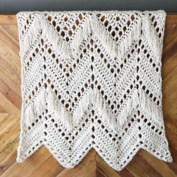 Monochromatic doesn't have to be boring! In this modern fringed crochet blanket free pattern, two weights of Lion Brand Wool-Ease yarn combine to add instant style and texture to any room of your house.