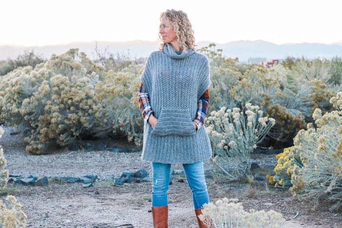 This simple free crochet poncho pattern is a little more fitted than most, offering a versatile wardrobe staple that's perfect for layering. The pocket and cowl turtleneck crank up the cozy factor! Made with Lion Brand Touch of Alpaca yarn in "Grey Oxford."