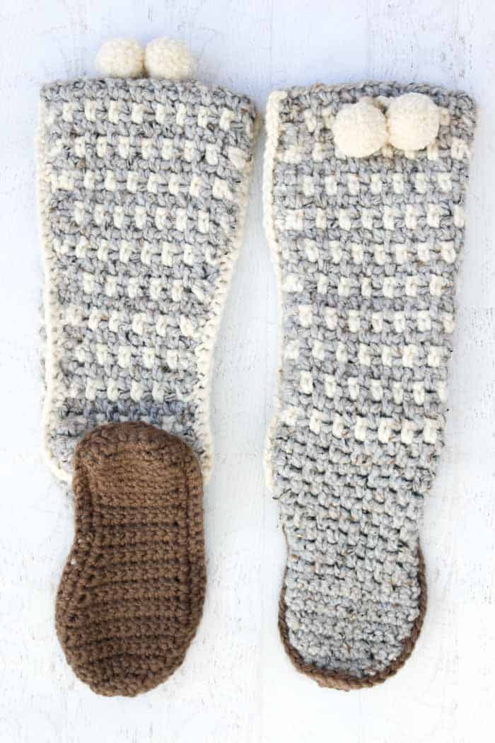 Free crochet mukluks slippers pattern and tutorial featuring Lion Brand Wool Ease Thick & Quick in grey marble, fisherman and taupe. These make a great crochet gift!