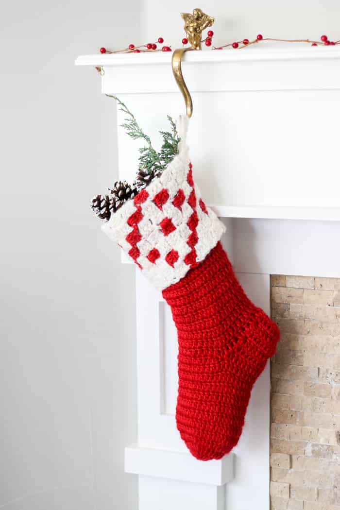 This free corner to corner (c2c) crochet pattern makes a gorgeous modern crochet Christmas stocking. The free pattern and tutorial make this heirloom easy to create in time for Christmas! 