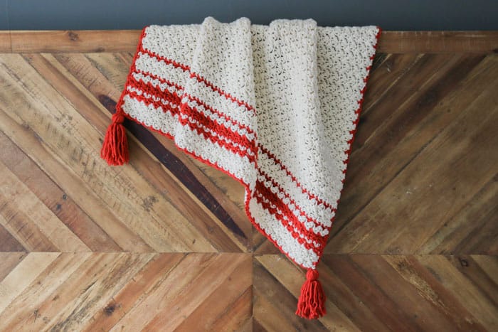 Free Christmas crochet patterns including the Hygge Holiday Throw by Make and Do Crew.