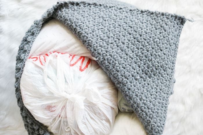 How to stuff a crochet or knit pouf (or bean bag) with plastic bags, newspaper, pillows or stuffing.