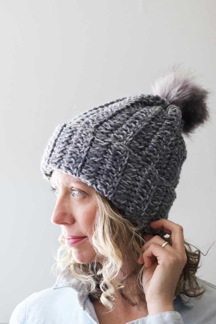 This free beginner crochet hat pattern is a perfect example of how to make crochet look like knitting using simple double crochet stitches. Featuring Lion Brand Wool Ease Tonal yarn in the color "Smoke."