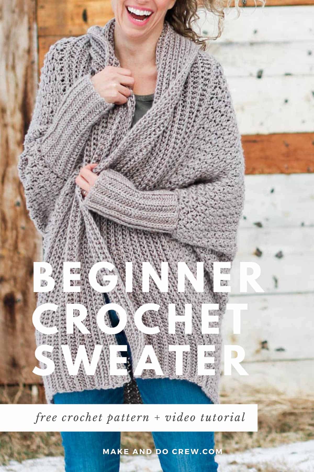 A woman snuggled into a crochet sweater made with the suzette stitch. Free pattern + video tutorial.