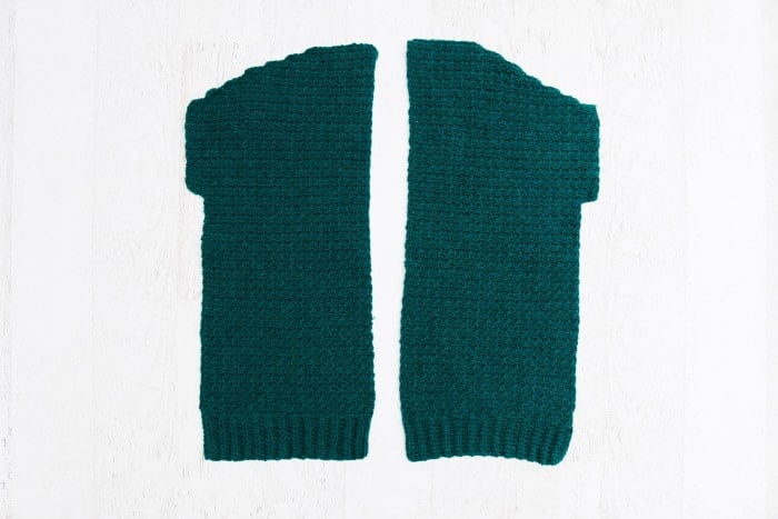 How to crochet a cardigan step by step: crocheting the front pieces out of Lion Brand Touch of Alpaca Yarn in "Jade."