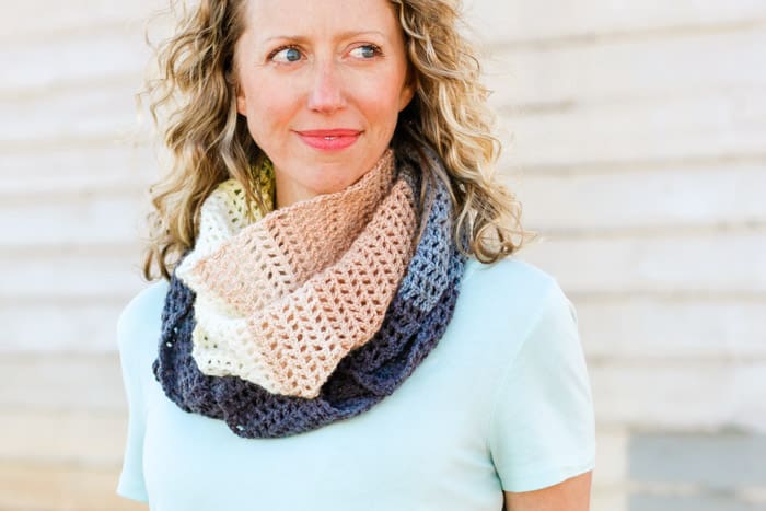Easy filet crochet triangle scarf using Lion Brand Mandala yarn in the color "Serpent."